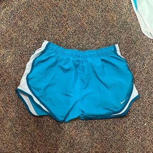 Blue Nike shorts